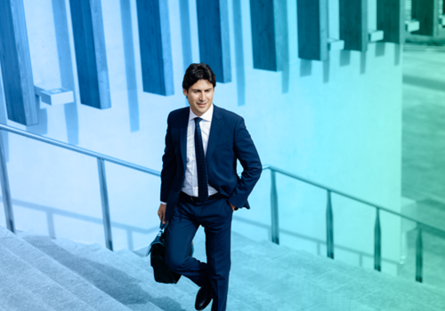 man walking up the stairs